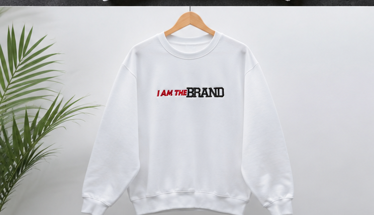 White I AM THE BRAND embroidered sweatshirt on hanger