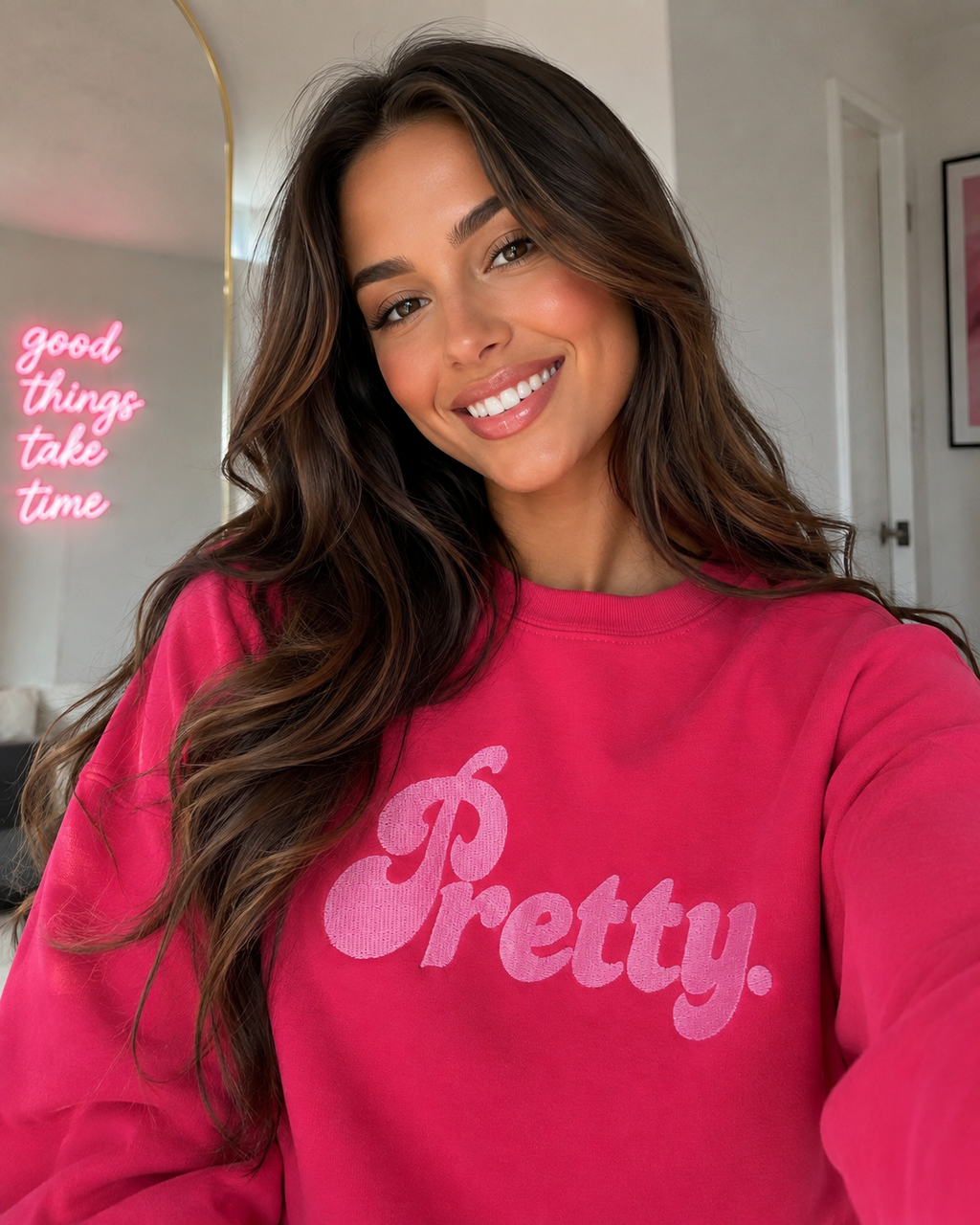 Model wearing bright pink Pretty embroidered crewneck sweatshirt by Pressora Prints