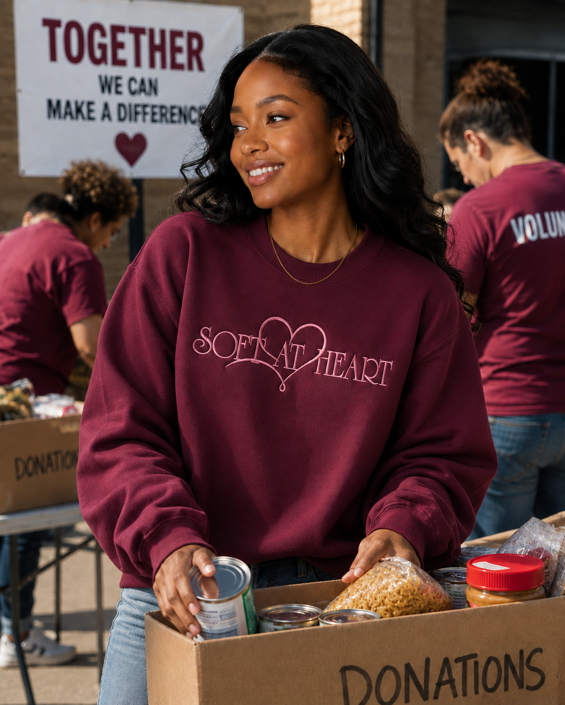 Model wearing burgundy Soft At Heart embroidered crewneck sweatshirt by Pressora Prints